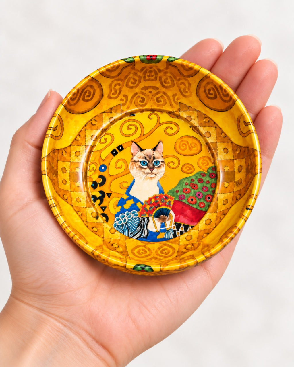 Golden Fan Cat mini steel catch-all by NIVUMA — in-hand scale view